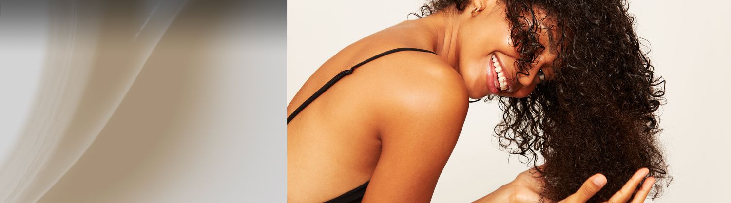 split image of lotion and model posing holding her hair 