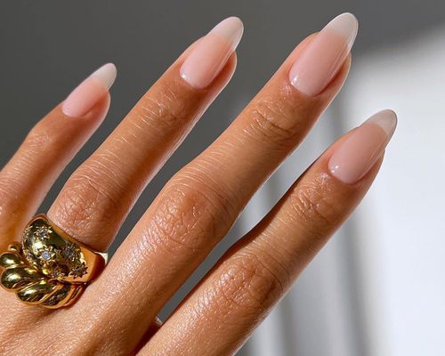 Translucent peachy clear manicure with glossy finish