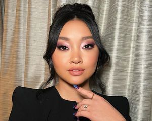 Close up of actor Lana Condor, purple eyeshadow bringing out her brown eyes