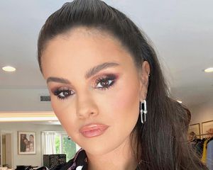 Selena Gomez wears a bronzed, contoured makeup look with dramatic eyeshadow