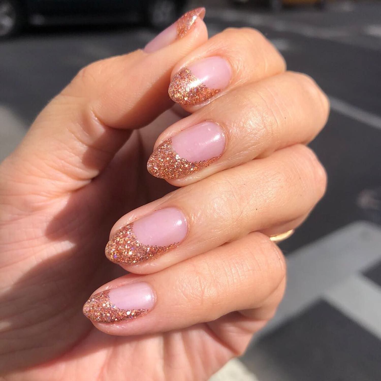 Manicure with rose gold glitter swoop tips