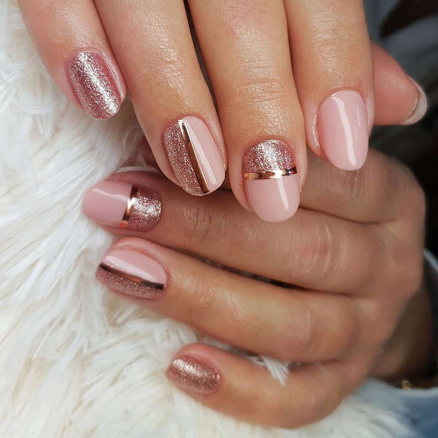 Rose gold manicure with glitter and metallic stripes