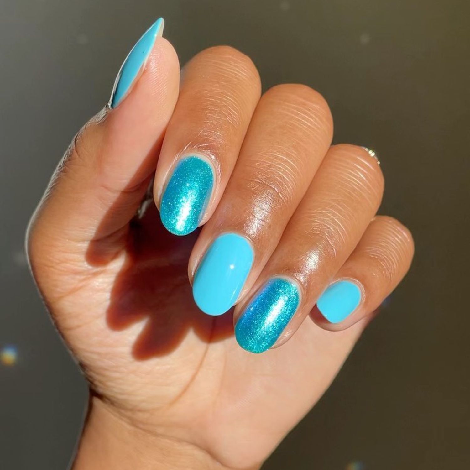 Aquamarine nails with shimmer and cream finish