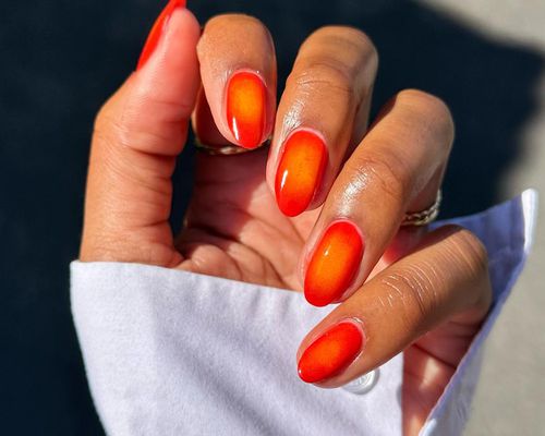 orange and yellow almond shaped aura nails