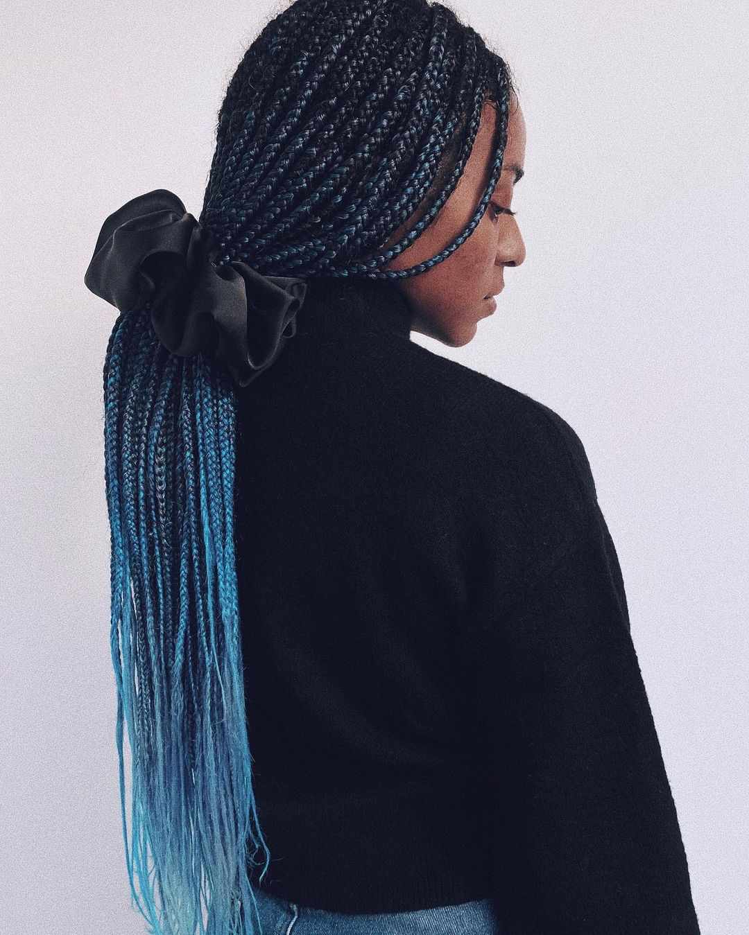 Blue ombre braids tied with a bow