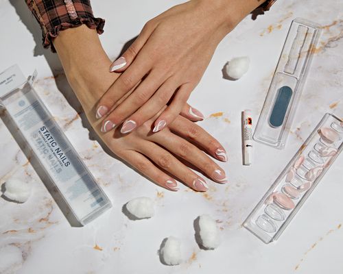 a woman's hands modeling a Static Nails press-on nail kit