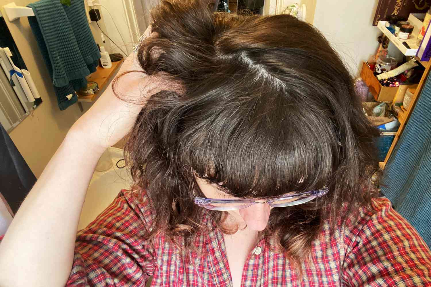 Close-up of woman's hair while testing Shaz & Kiks Balancing Clay Hair Cleanser