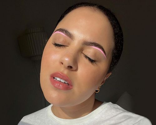 Woman with Light Pink Makeup Under Eyebrows