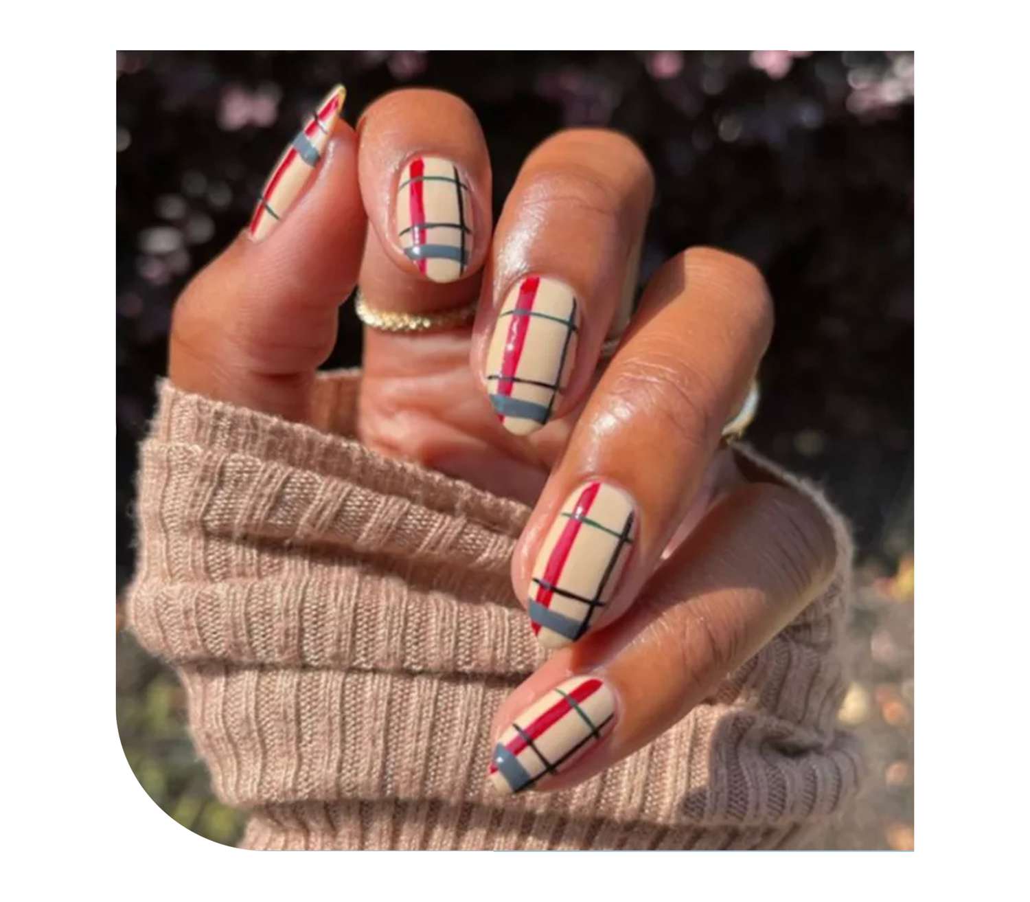 model wearing plaid nail art