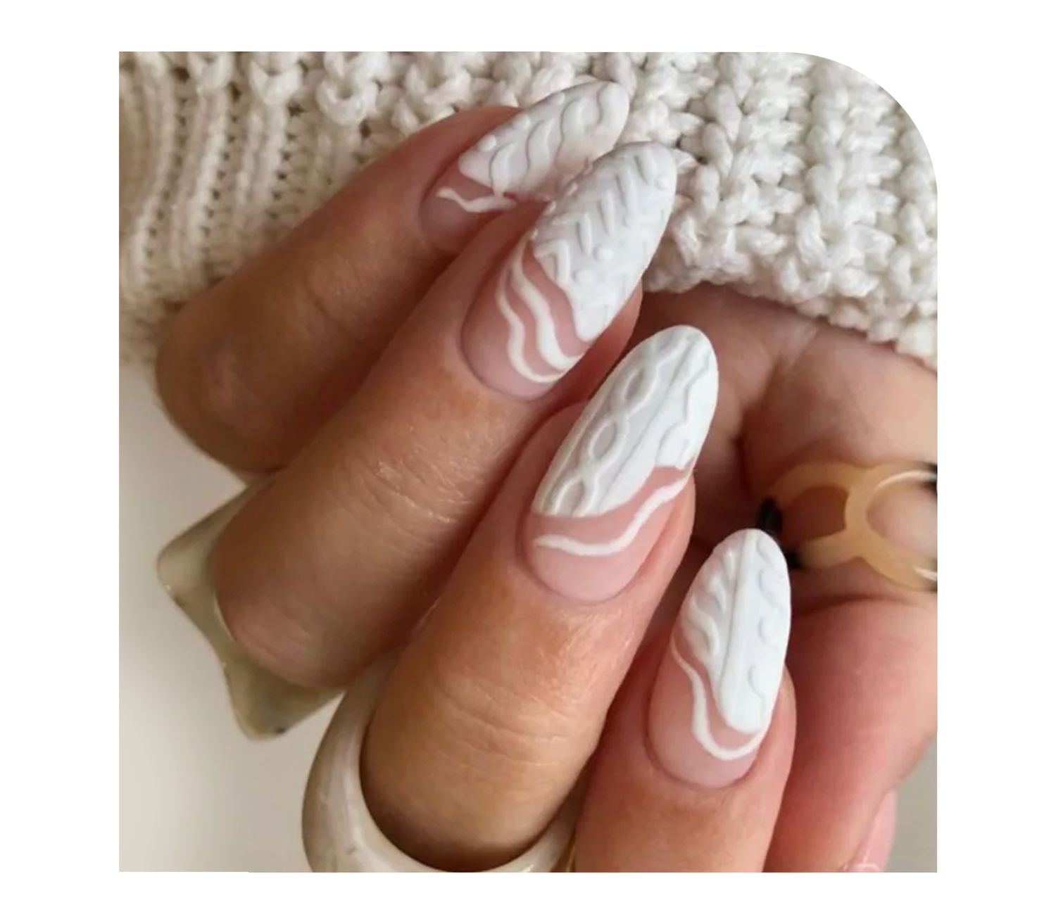 Model wearing sweater nail art