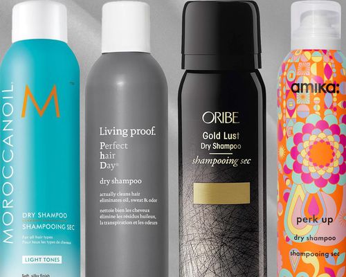 A collage of dry shampoo we recommend, from Moroccan Oil, Living Proof, Oribe, and Amika, on a grey background