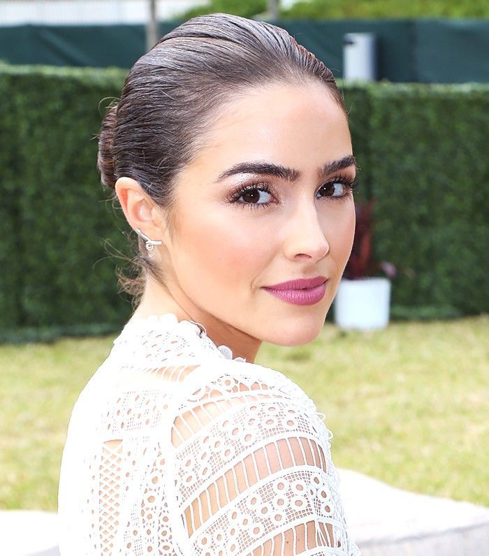 Olivia Culpo in a white dress