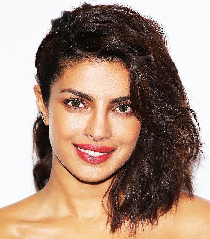 priyanka chopra smiling with a red lip