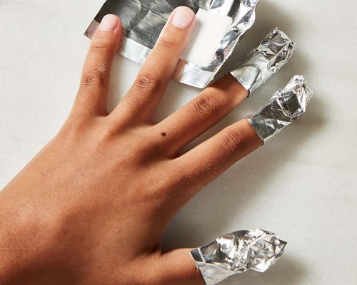 nails partially wrapped in foils for dip powder removal