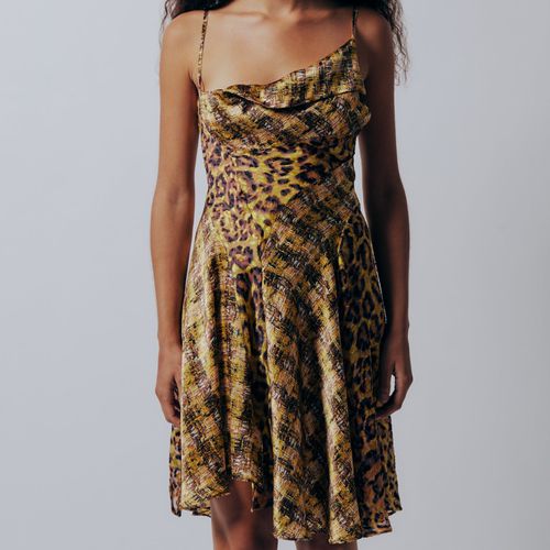 Gauntlett Cheng Multi Print Bias Dress in neutral leopard and plaid on model