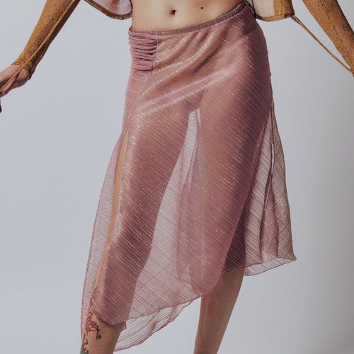 Gauntlett Cheng Pleated Asymmetric Skirt in pink on model