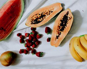 fruit on white table cloth