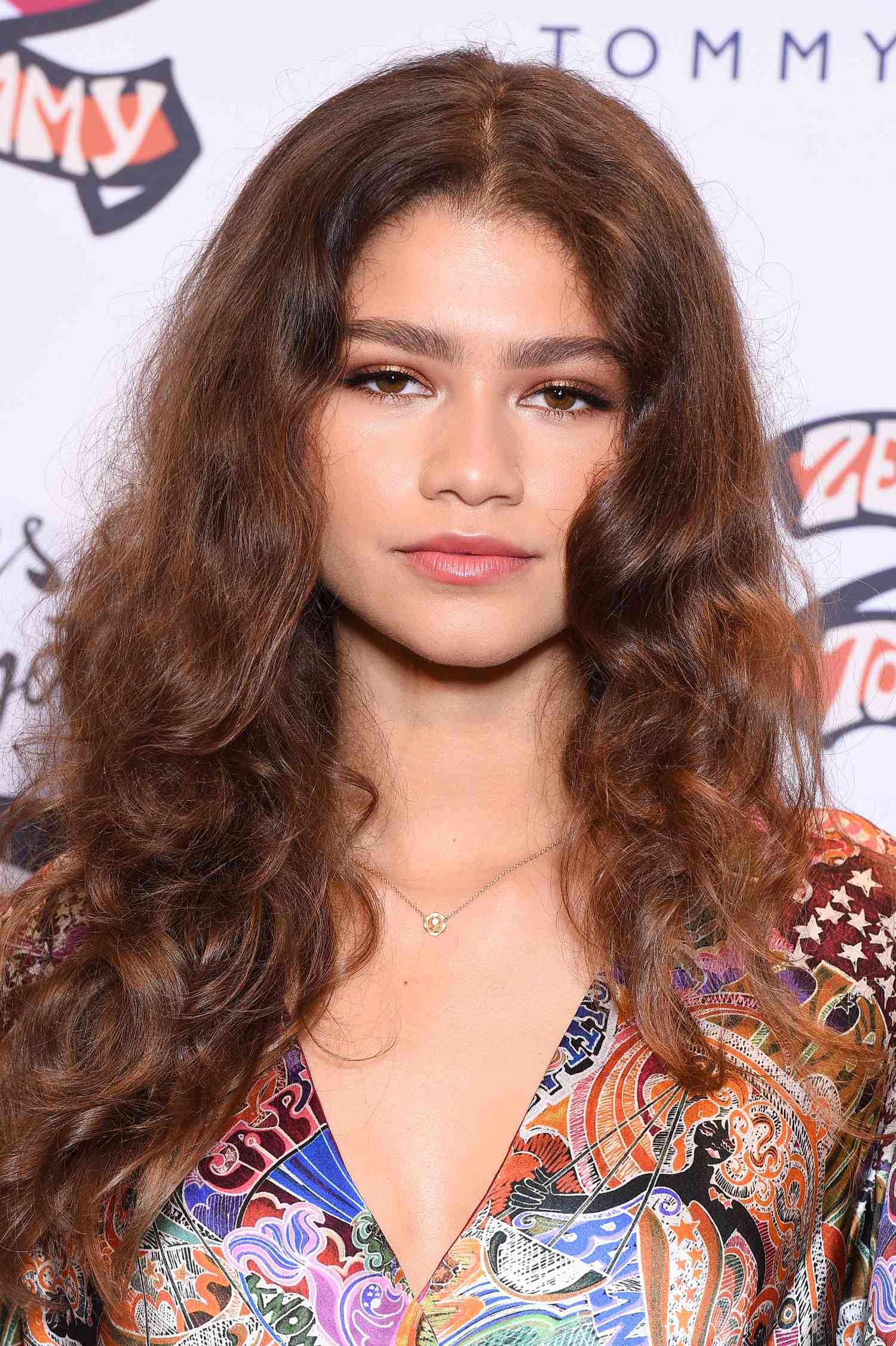 Zendaya with warm, touseled curls