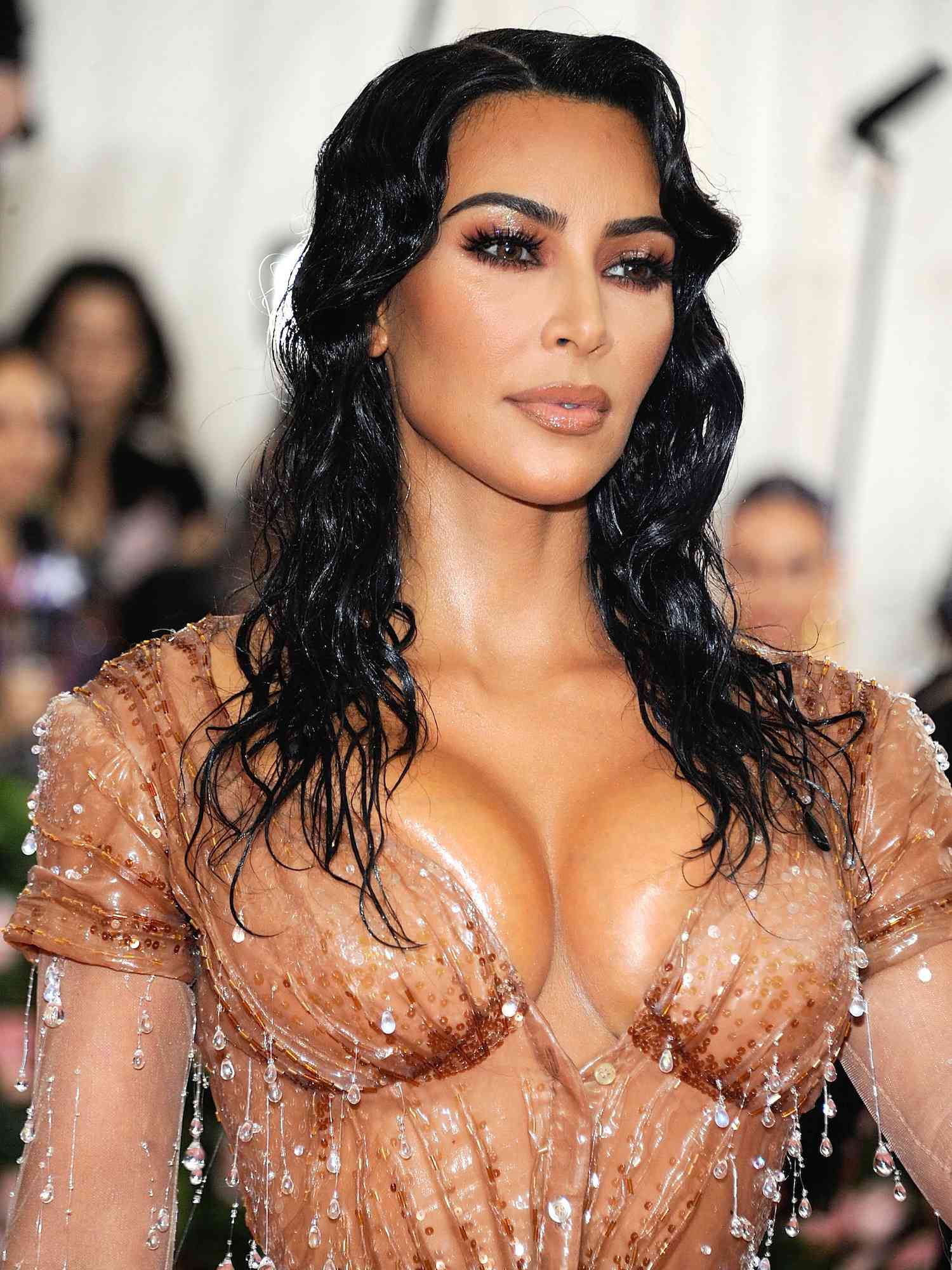 Close-up of Kim Kardashian with wet-look hair and a custom Mugler dress at the 2019 Met Gala