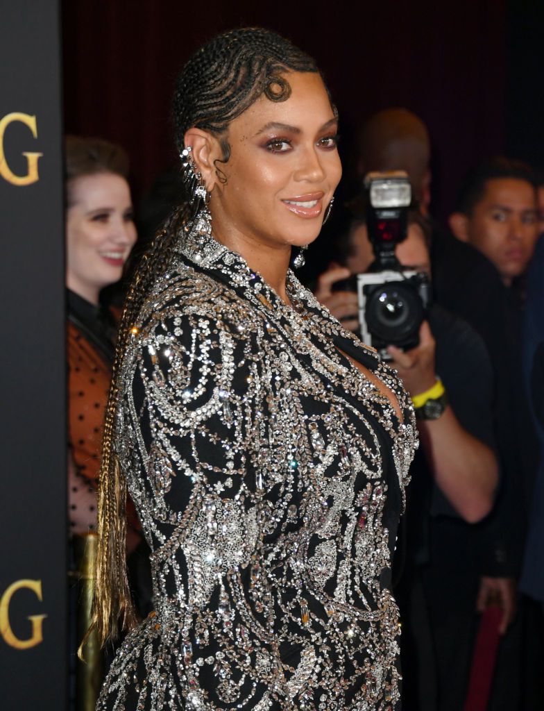 Beyonce with long braids and a finger wave