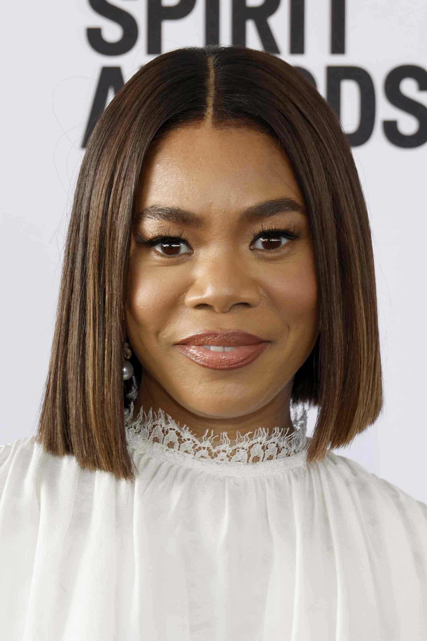 Regina Hall with a centered parted brown bob