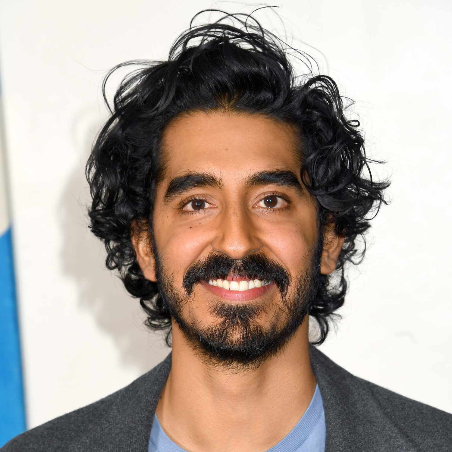 long hairstyles for men - dev patel