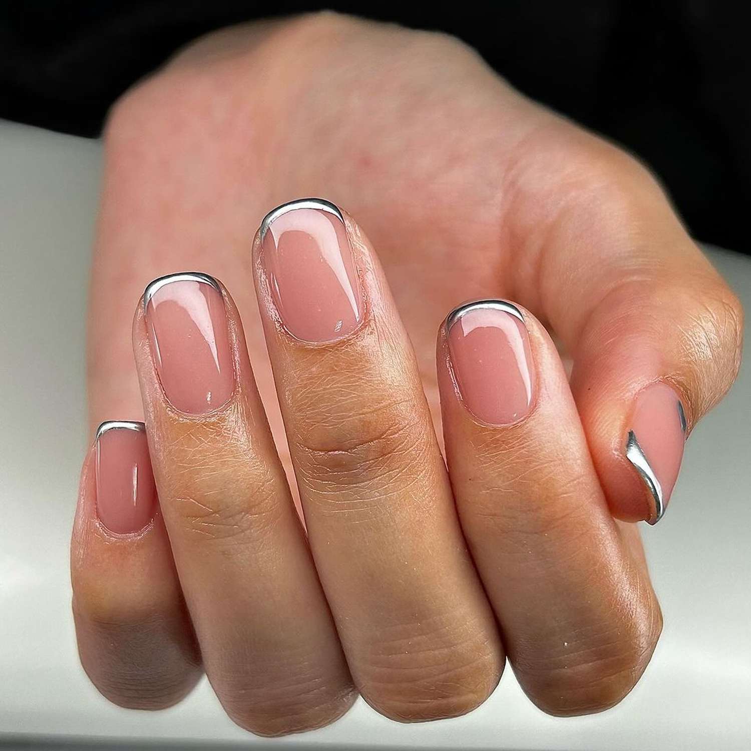 Short squoval nails with micro chrome French tips