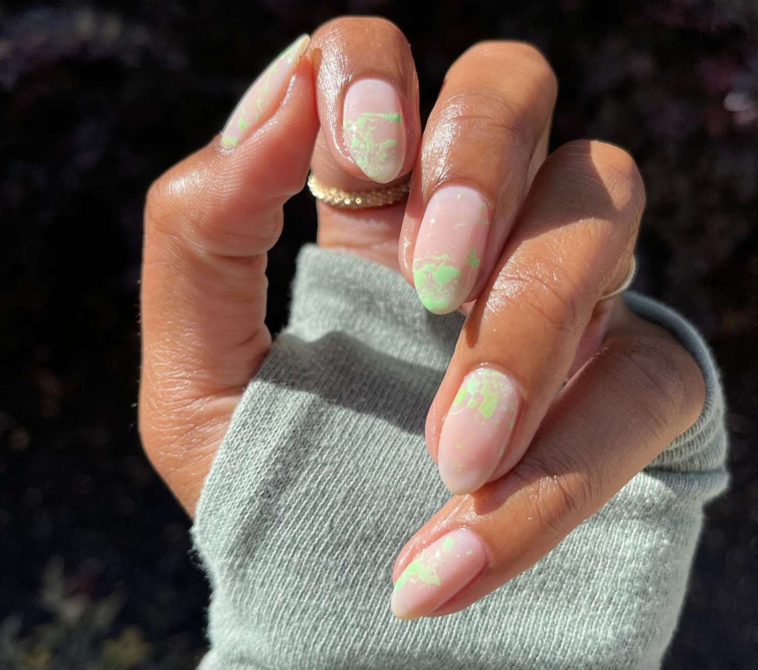 Nude nails with neon splatter