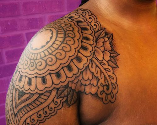 tattoos on dark skin tones