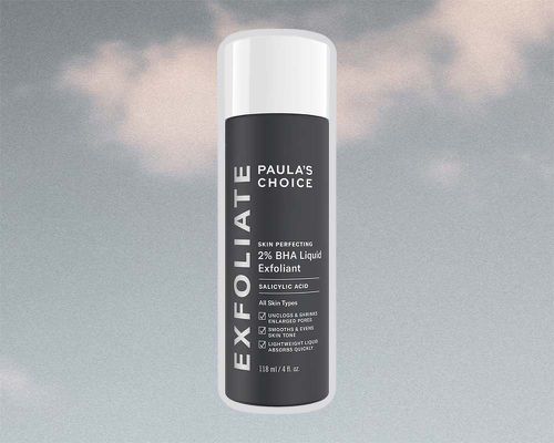 Paula's Choice Skin Perfecting 2% BHA Liquid Exfoliant on a background of blue sky and clouds