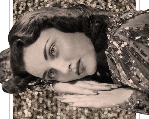 woman laying on glitter background