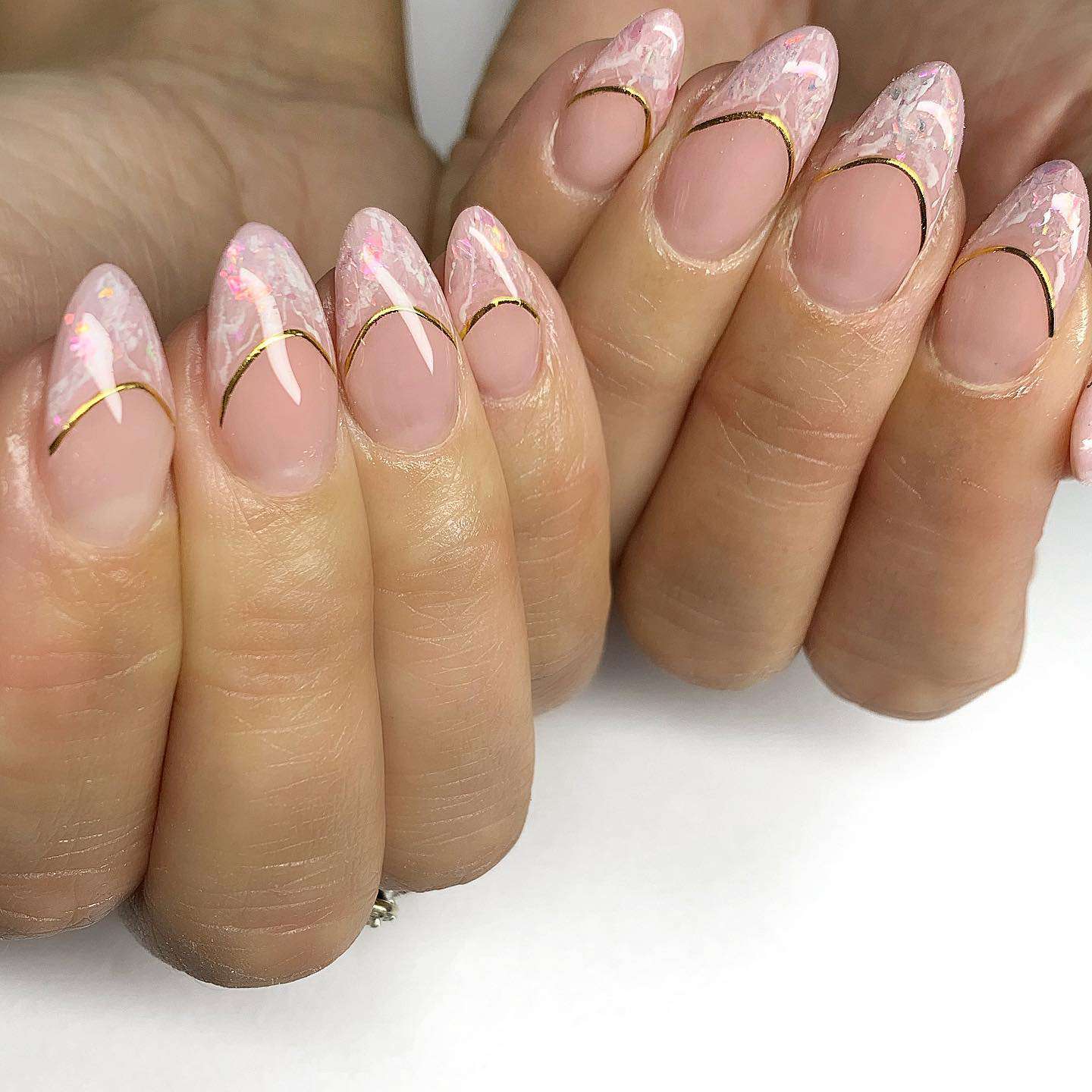 Rose quartz French manicure with rose gold dividing line