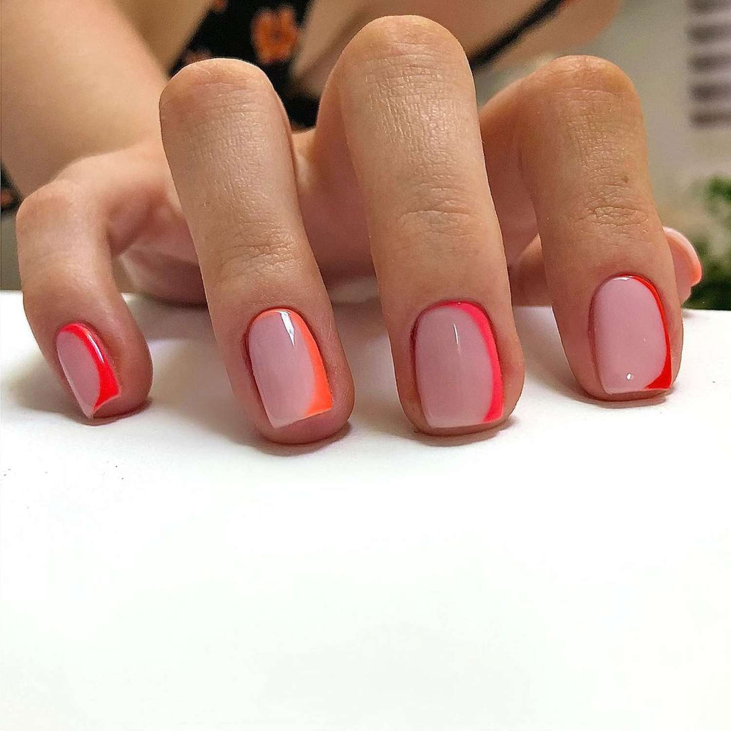 Square nude nails with hot red and orange edges