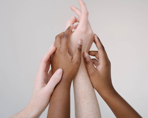 hands of different skin tones