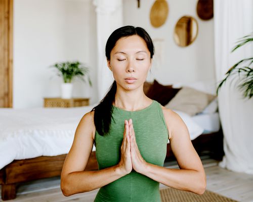 person doing a sun salutation