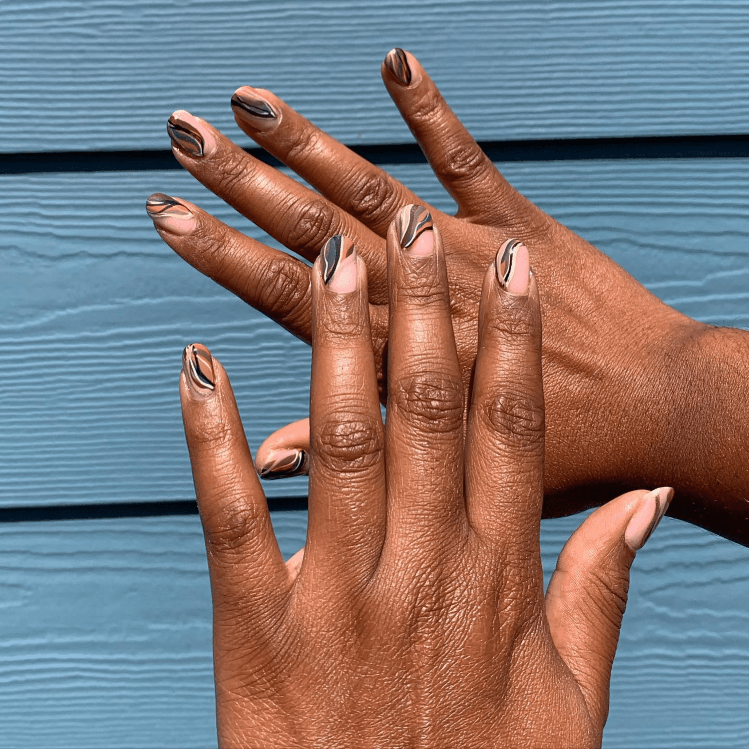 dark multi colors marble effect negative space nails