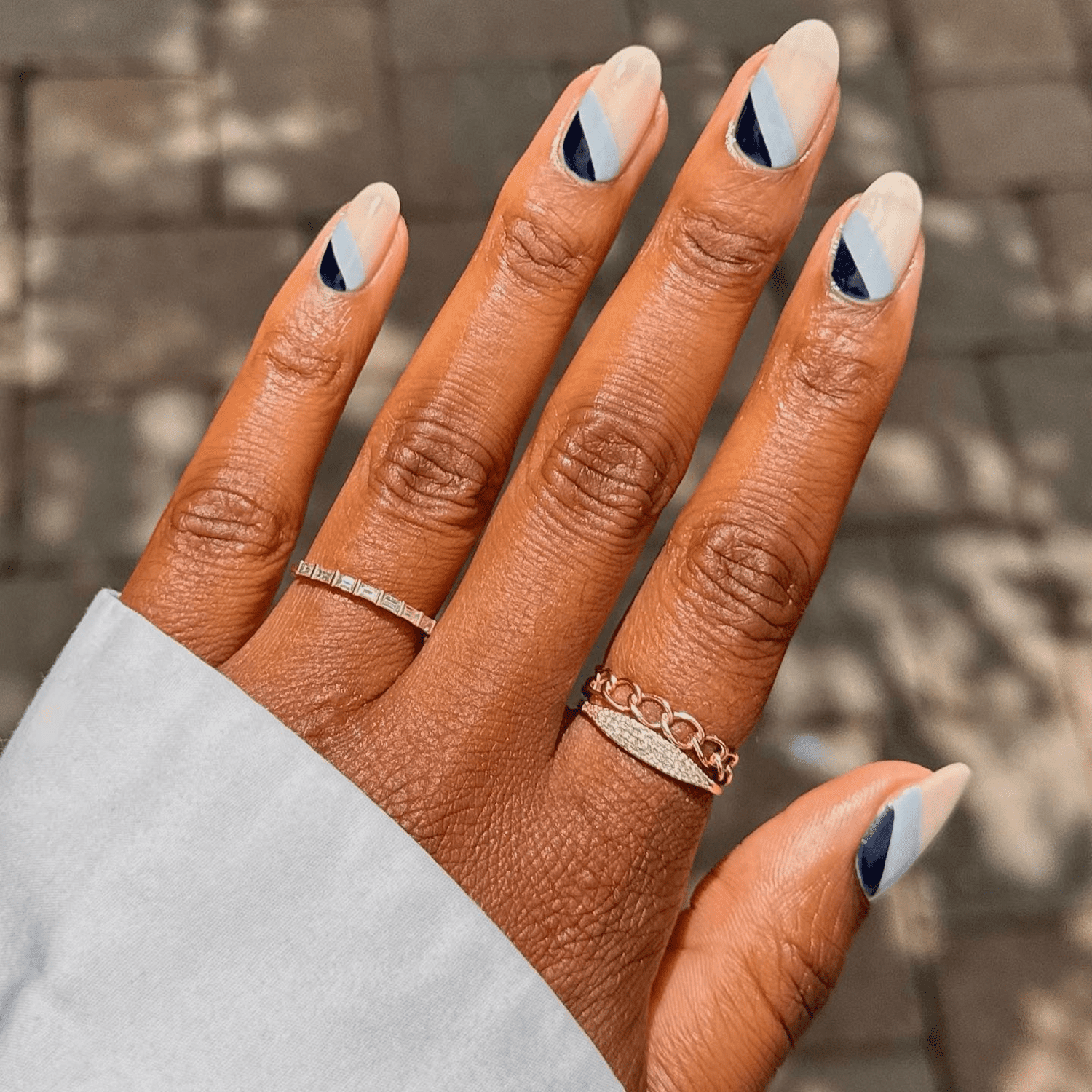 navy and light blue nautical stripes negative space nails