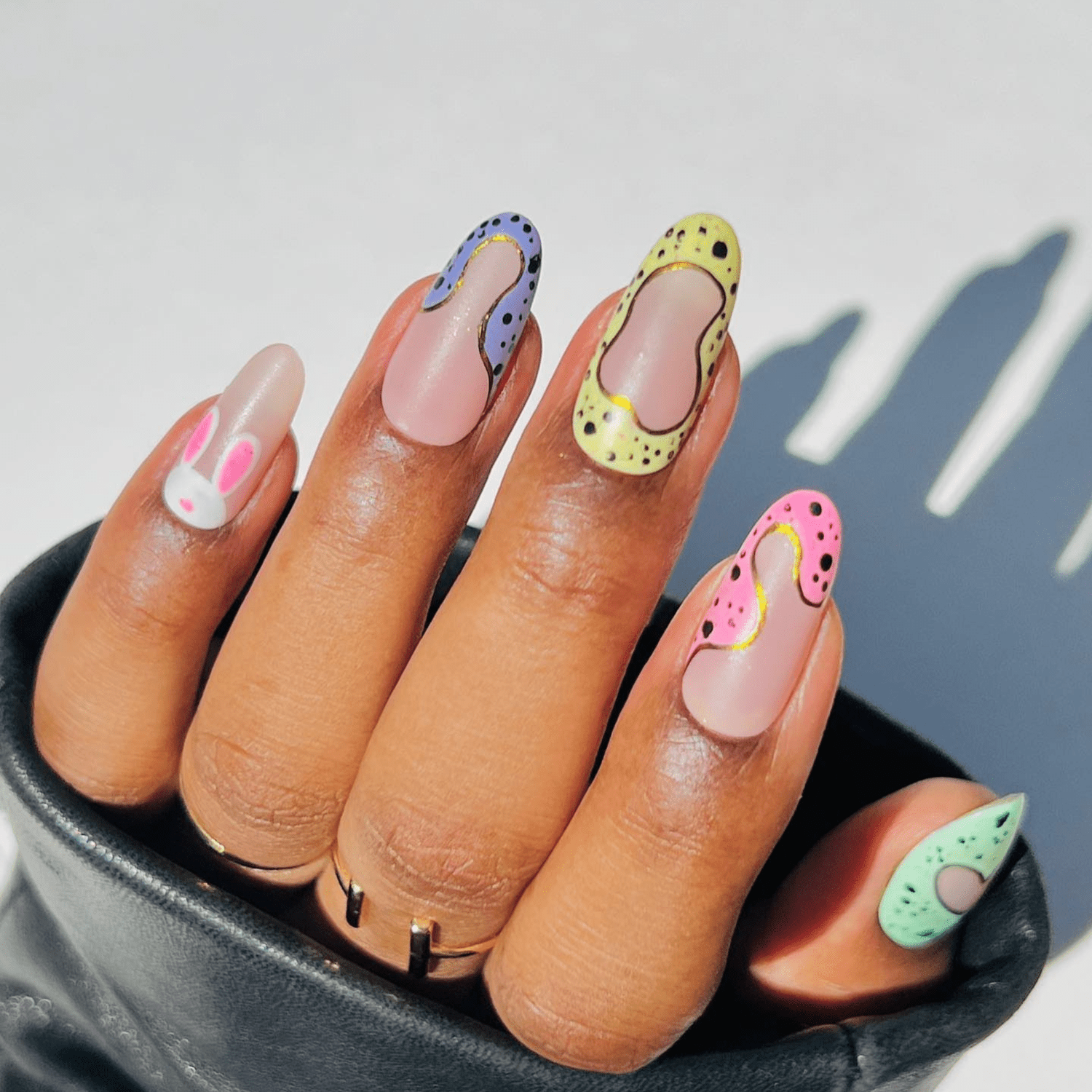 dinosaur easter egg negative space nails