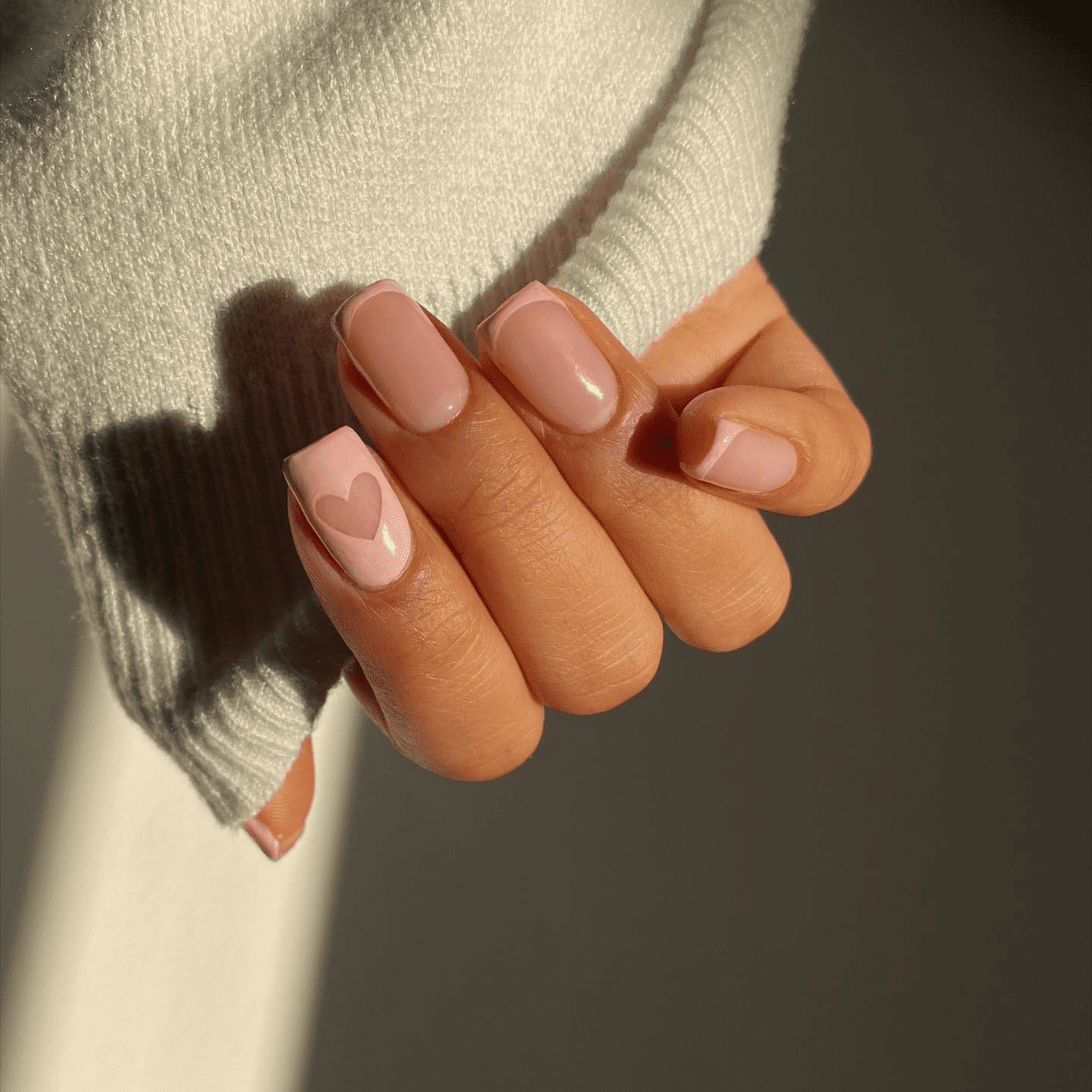 baby pink french tips and heart shape negative space design