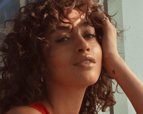 Model Alanna Arrington with curly hair