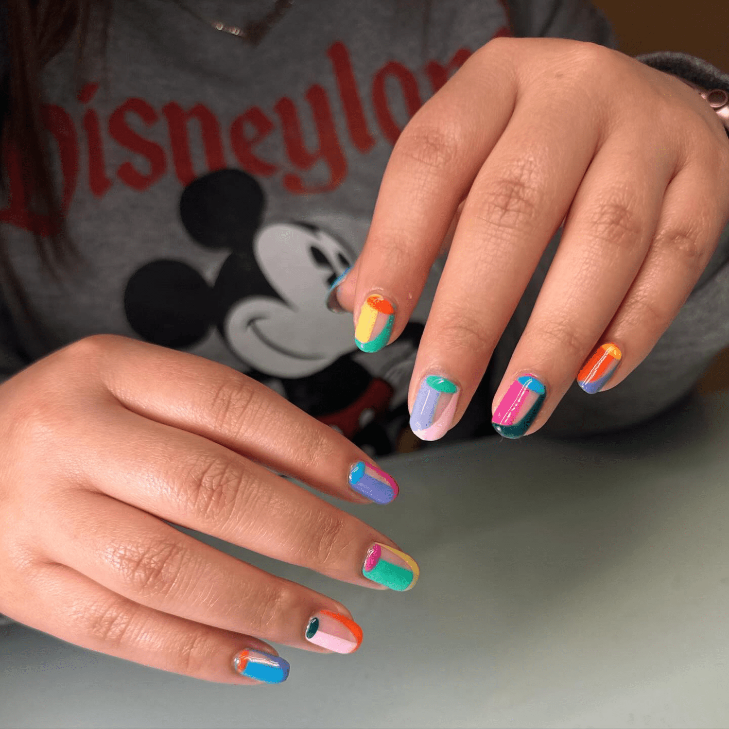 colorful abstract short negative space nails 