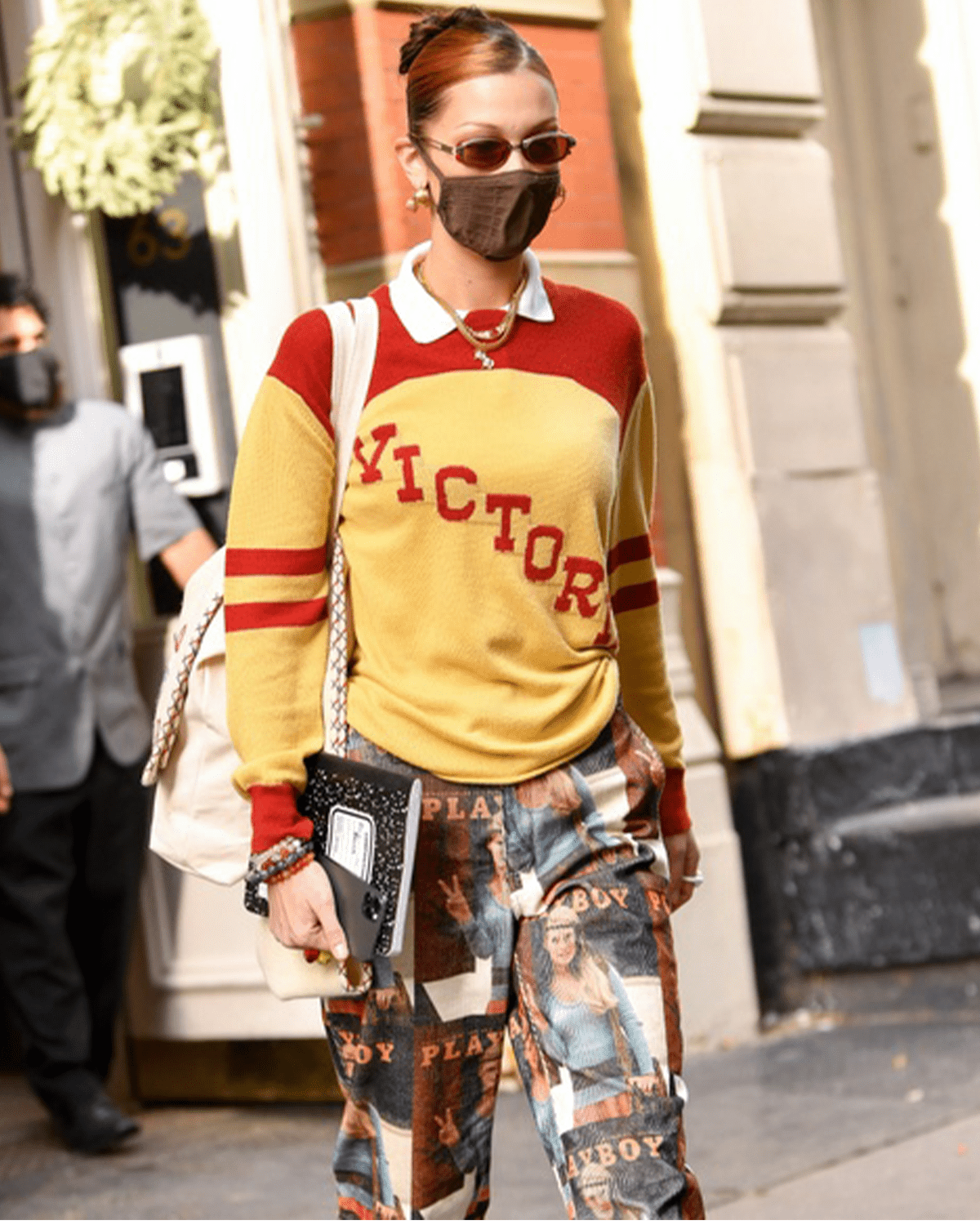 Bella Hadid wearing a varsity top 