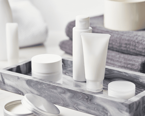 Close up of bottles and jars on a vanity