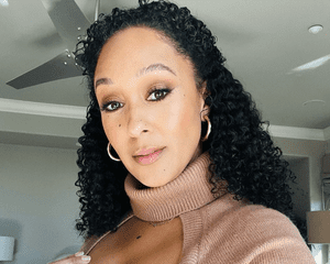 Tamera Mowry with curly hair