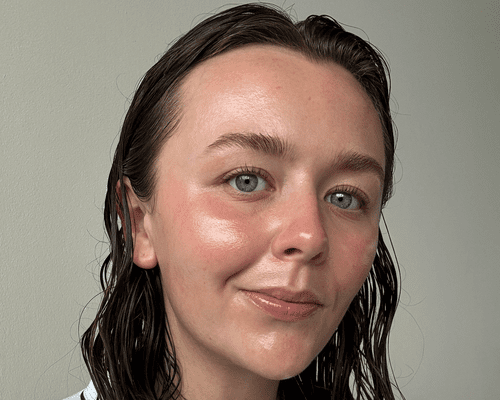 close up selfie of woman with dewy skin 