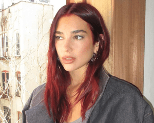 Dua Lipa with red hair.