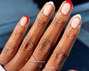 red, white, and gold french nails