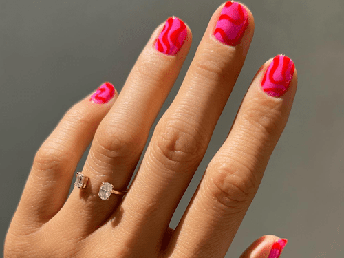 pink and red swirly manicure
