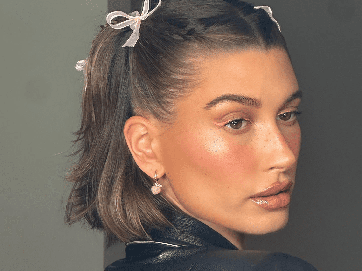 Hailey Bieber wearing pink hair bows