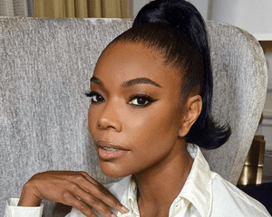 gabrielle union wearing neutral makeup and high ponytail